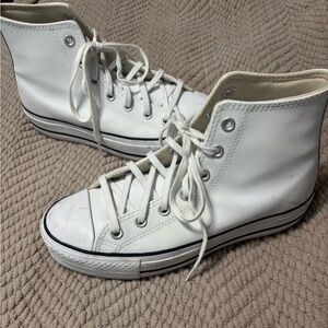 Converse Cream High-Top Sneakers
Chuck Taylor all star lift